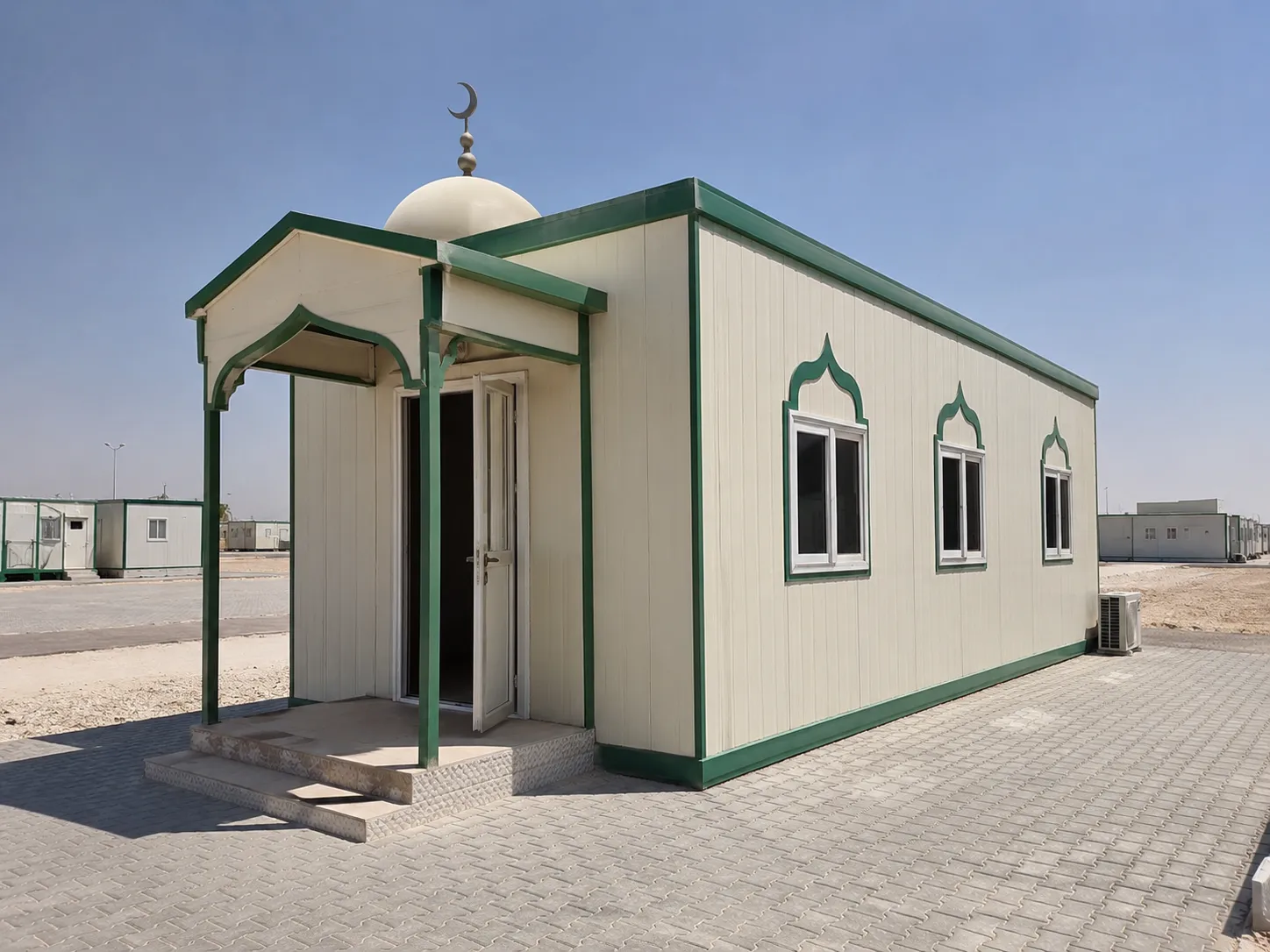 Prayer room with a white dome and a covered porch at a labour camp