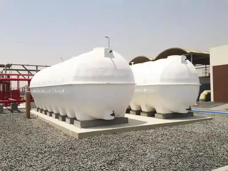 Two GRP water tanks installed on a concrete base
