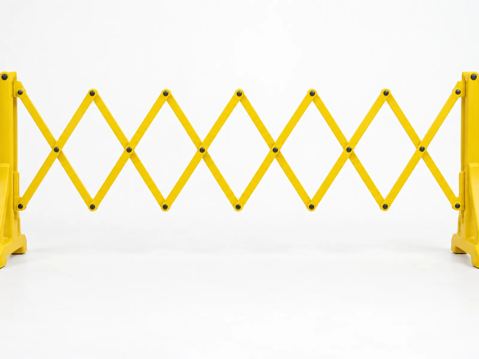A yellow barrier fully extended, standing on its own feet