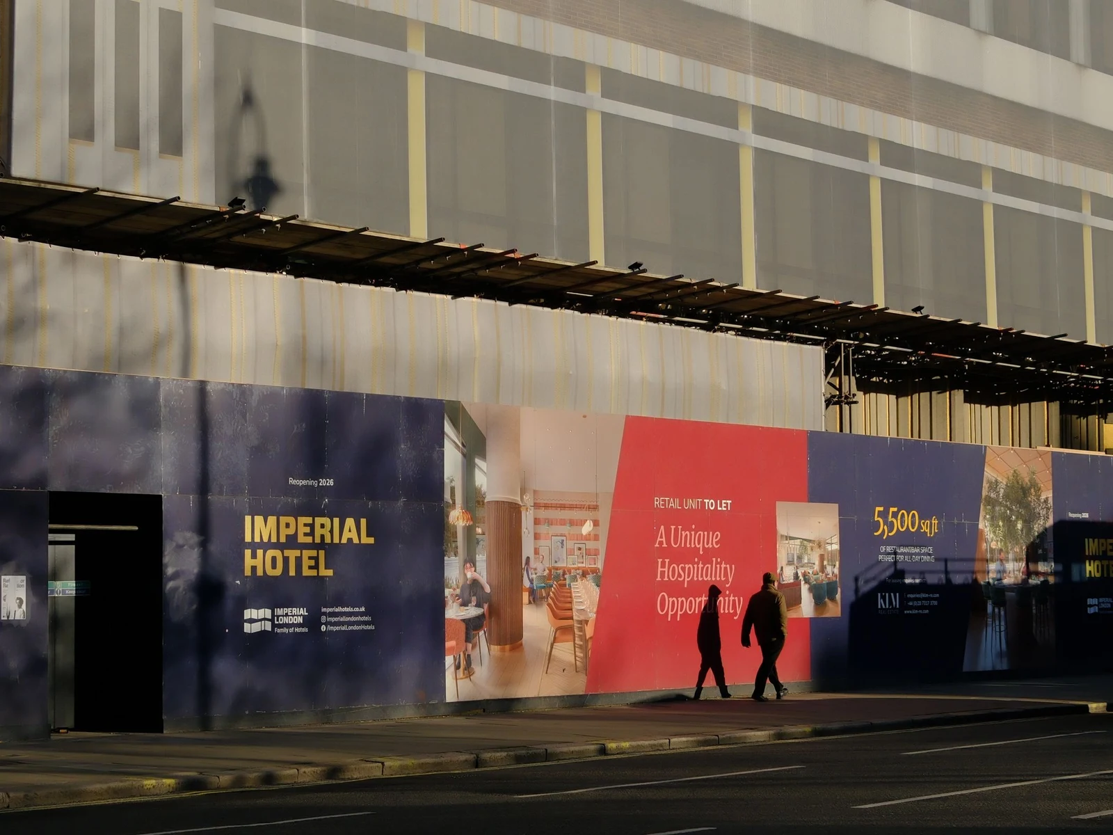 Printed graphic hoarding around a city construction site