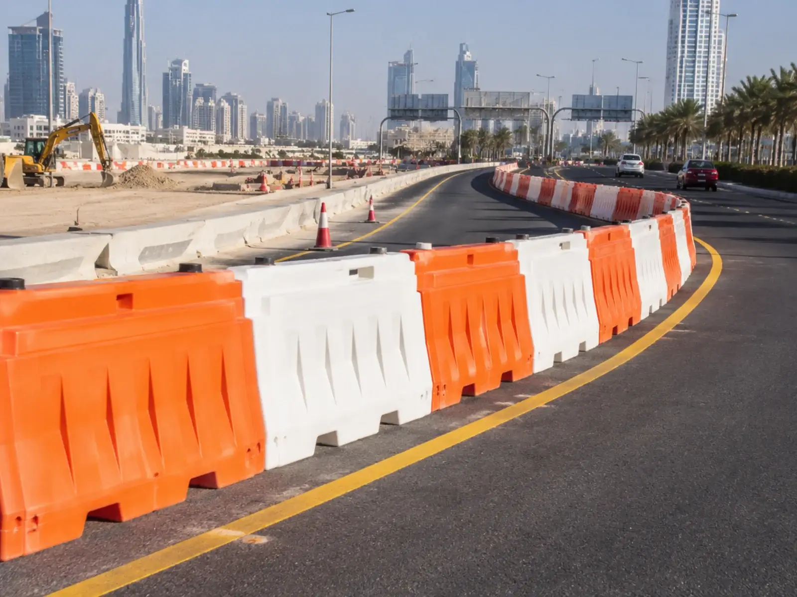 Water-filled plastic and precast concrete jersey barriers on a Dubai road diversion